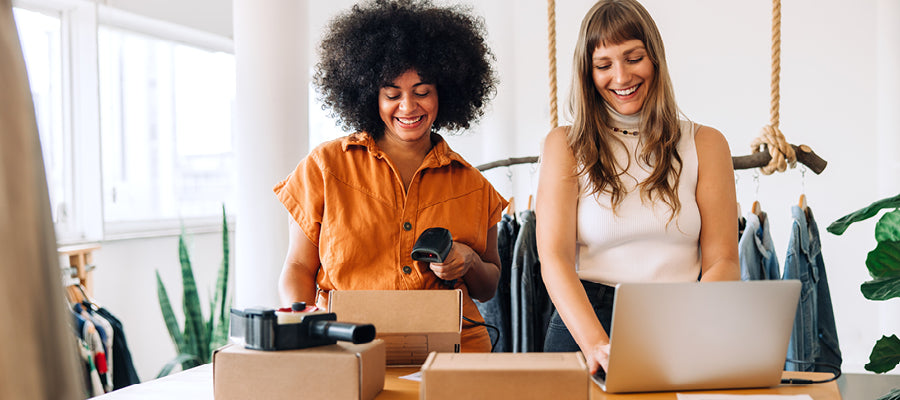 2 women checking out clothes